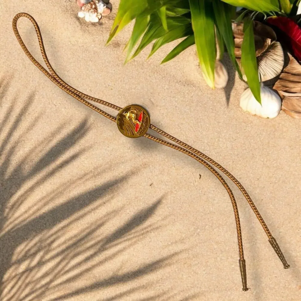 Vintage Hawaiian Bolo Tie Mens Coastal Cowboy Brass 3D Medallion Fabric Chord